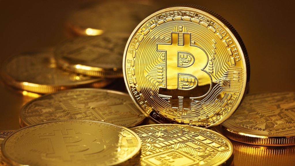 Bloedbad bij Bitcoin doet verkopen gouden munten boomen