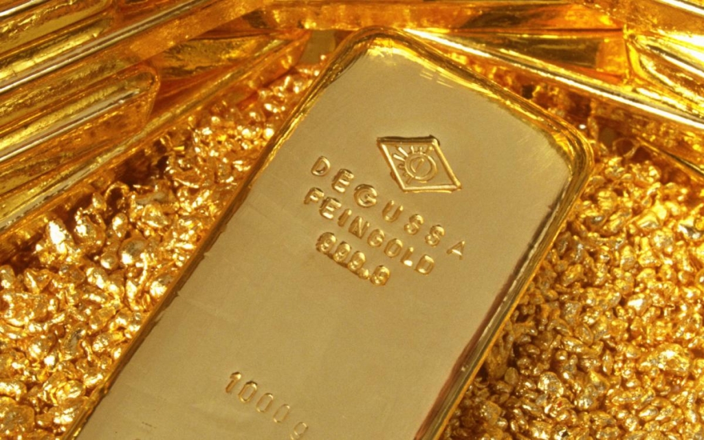 Welke factoren bepalen momenteel de goudprijs?